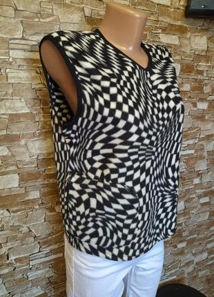 Тепленька,флісова жилетка,безрукавка,жилеточка,кишені,нова, divided