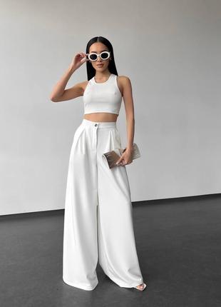 Брюки палаццо штани