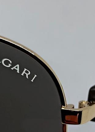 Окуляри в стилі bvlgari каплі сонцезахисн чорні однотонні в золотому металі8 фото