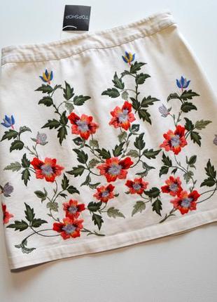 Трендовая белая котонавая юбка в вышивку цветы3 фото